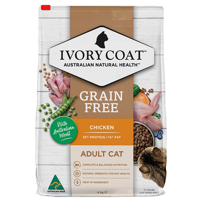 A 4 kg bag of Ivory Coat Grain Free Adult Cat food, Chicken flavor, featuring a white and brown packaging design with illustrations of raw chicken, peas, and a cat.