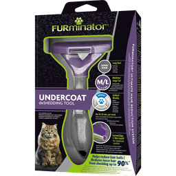 Furminator Undercoat Shedding Tool in its retail packaging, featuring a purple and gray grooming brush with a cat illustration on the box.